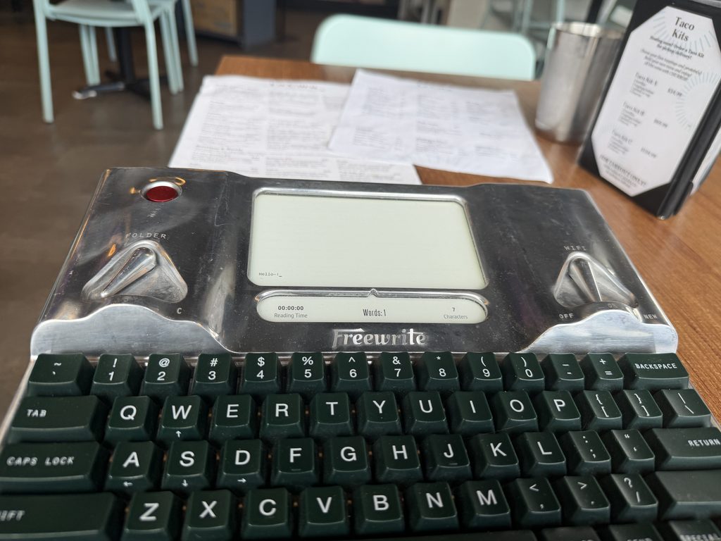 My Hemingwrite setup as I wait to order my tacos at La Cara.