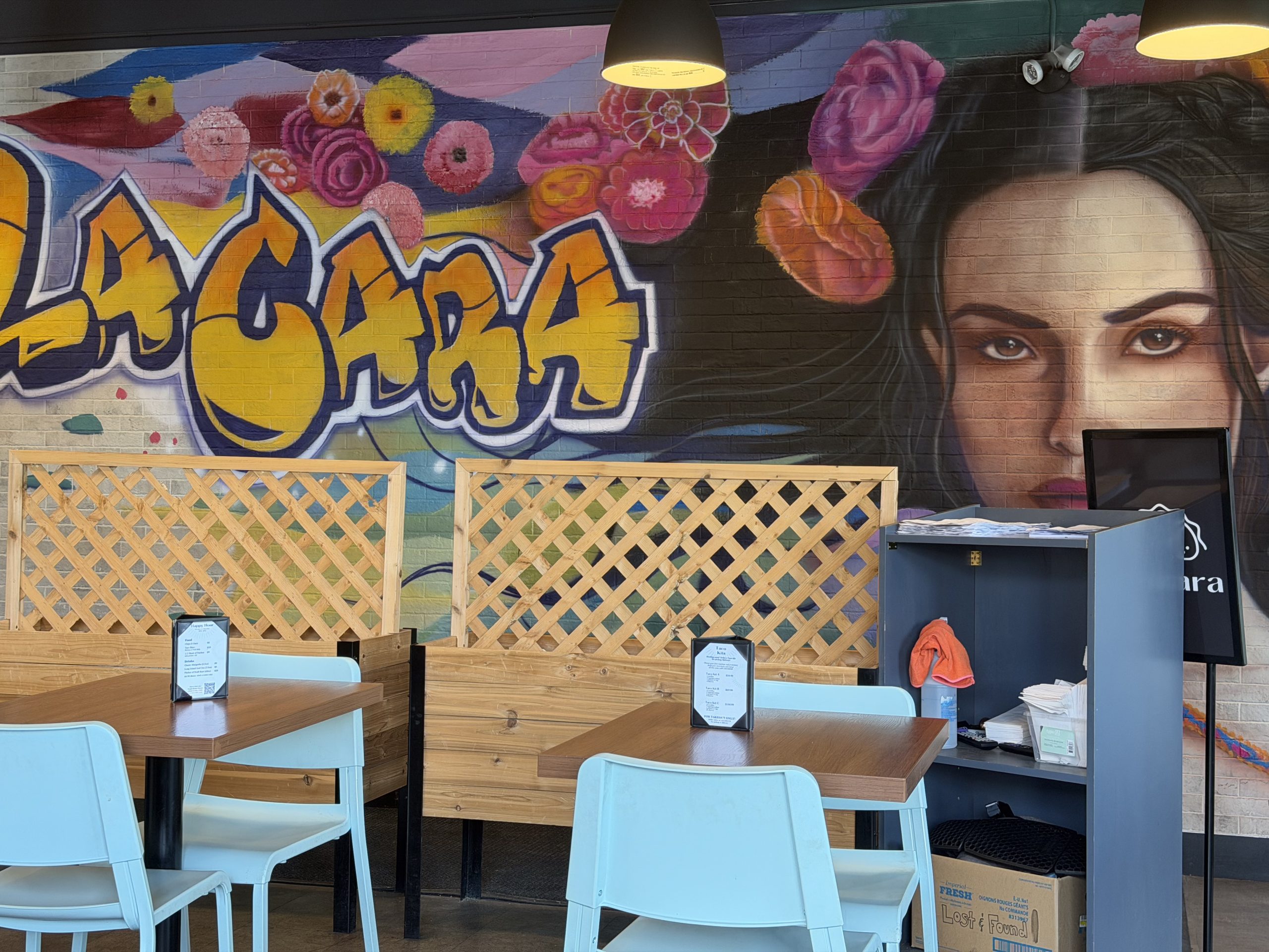 The mural on the wall near the entry way at La Cara