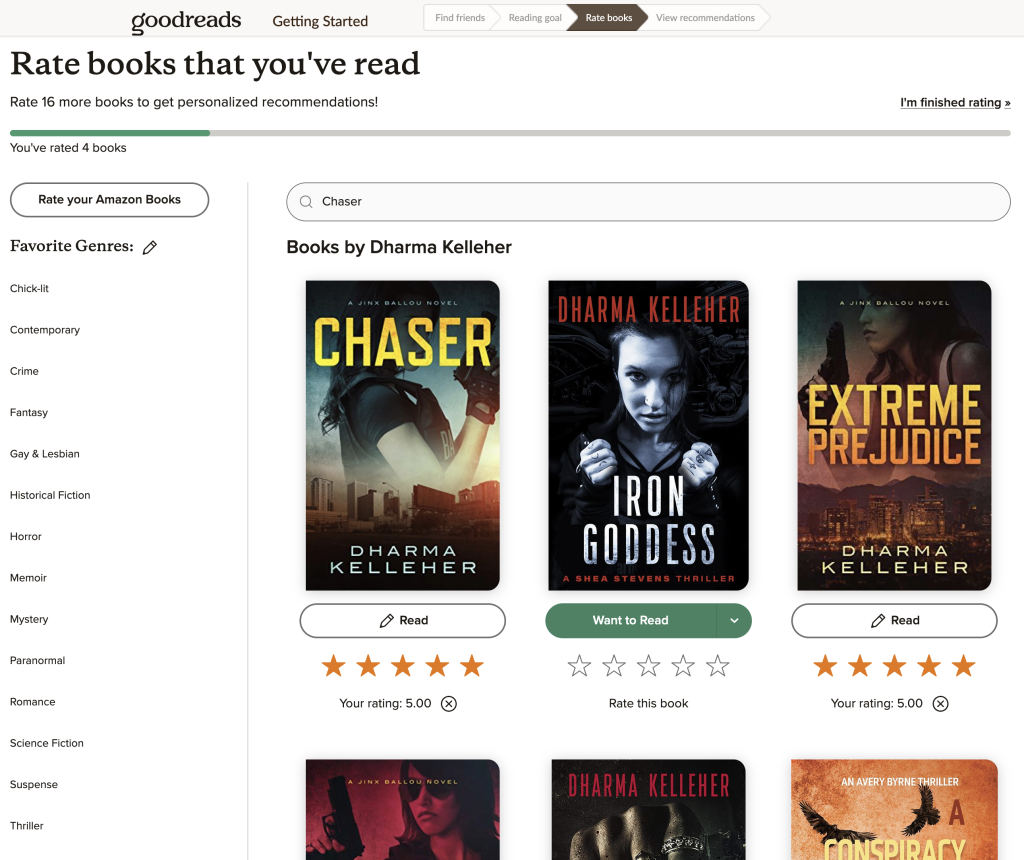 Me selecting the first two books of Dharma Kelleher's Jinx Baillou series, Chaser and Extreme Prejudice.