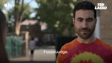 A GIF of Roy Kent from Ted Lasso saying "Fuck", but correcting himself to say "Fuuuuuudge" because he's at his niece's school.