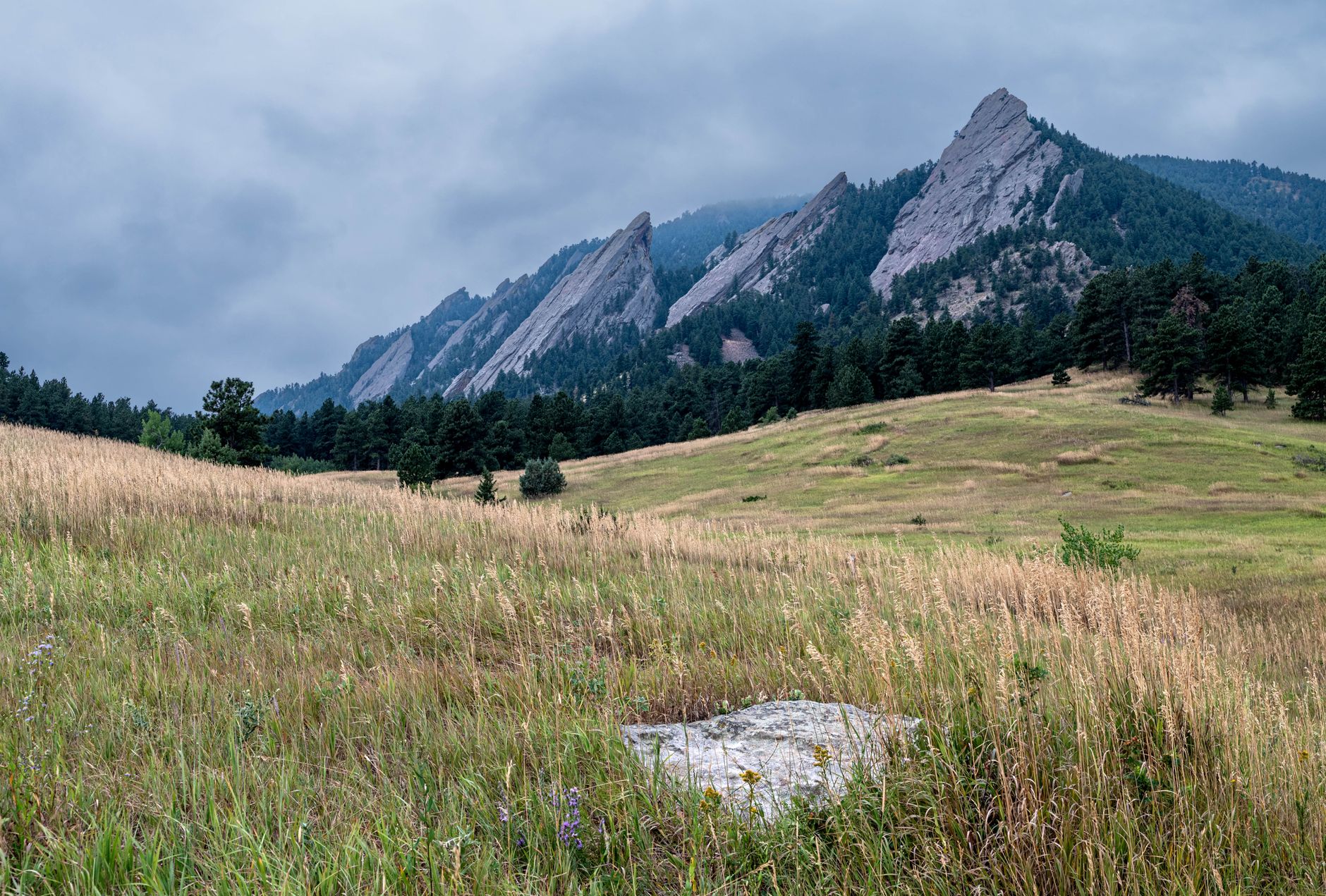 stunning view of boulder s flatirons in summer